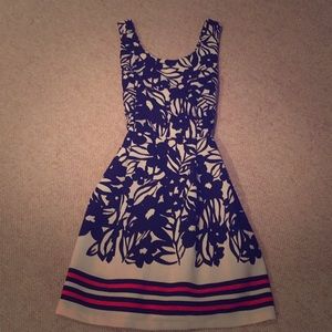 Floral patterned dress with a pop of color